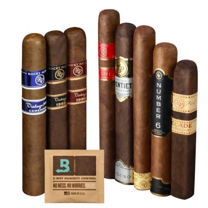 Assorted cigars with branded bands and a packet of 2-way humidity control.