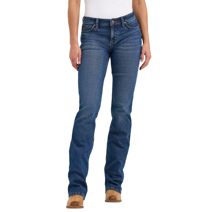 A person is wearing blue, straight-leg jeans with a classic five-pocket style and brown shoes.