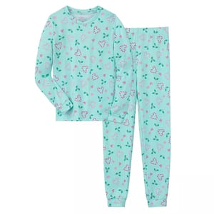 A light blue girls' pajama set with a long-sleeve top and pants, featuring a pattern of pink and white hearts with green leaves scattered throughout.