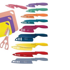 A colorful knife set with protective sheaths, three cutting boards, and a pair of kitchen shears.