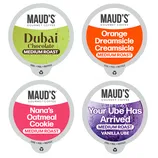 Four Maud's Gourmet Coffee K-cup labels for medium roast flavors: Dubai Chocolate, Orange Dreamsicle Creamsicle, Nana’s Oatmeal Cookie, and Your Ube Has Arrived Vanilla Ube.