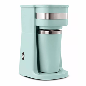 A teal single-serve coffee maker with stainless steel accents and a matching insulated travel mug.