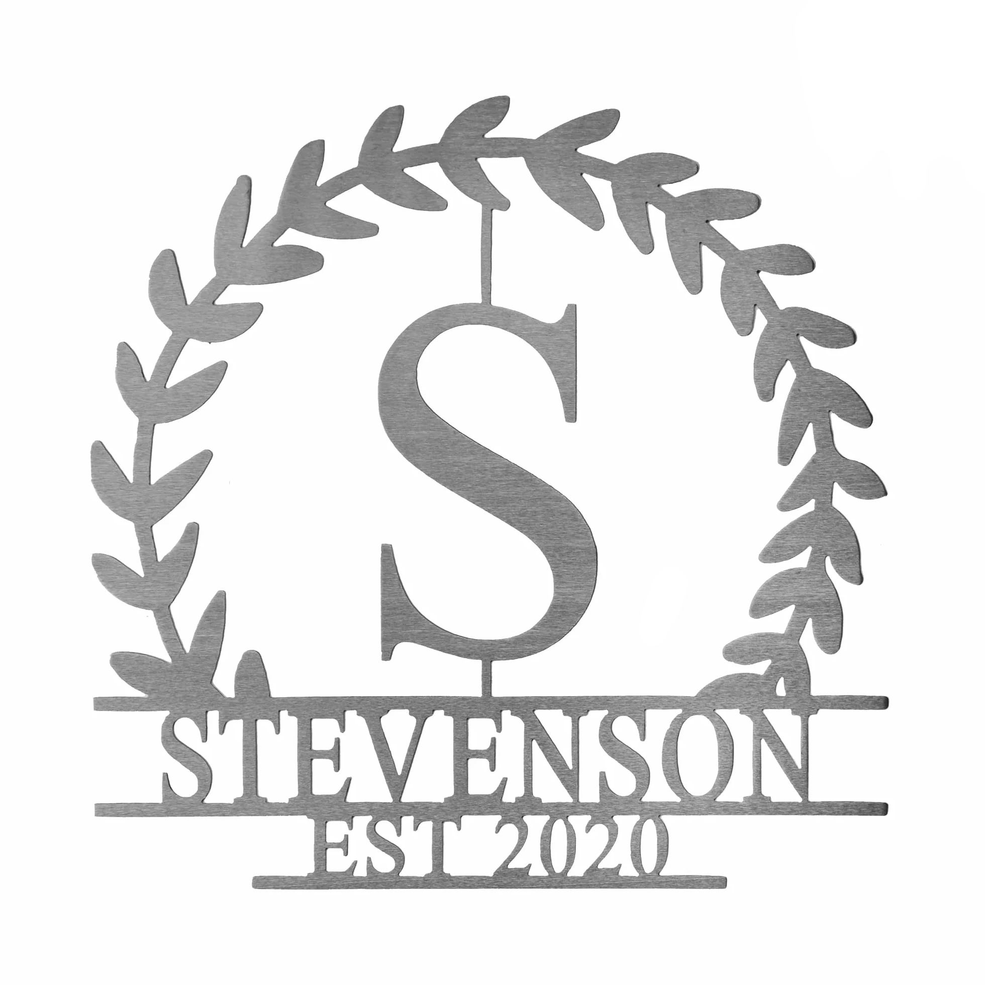 Metal wall art featuring a large letter \“S,\“ surrounded by a laurel wreath, with \“STEVENSON EST 2020\“ below.