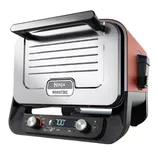Cordless outdoor Ninja Woodfire grill and smoker, featuring a temperature display and control knobs, with a mail-in savings option shown.