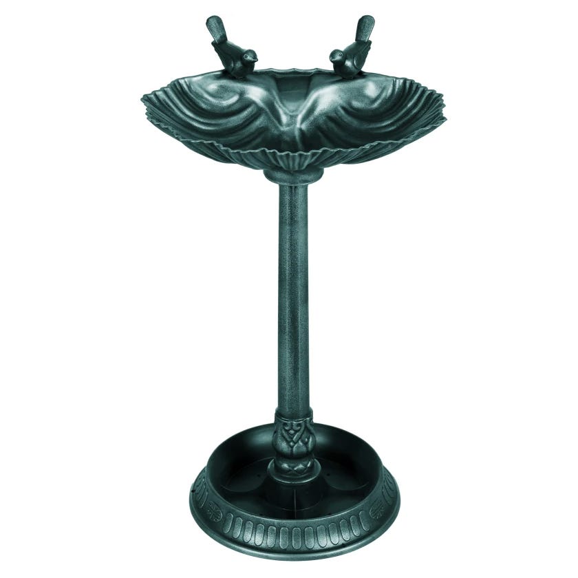 A decorative bird bath with a textured pedestal design, featuring two sculpted birds on the rim.