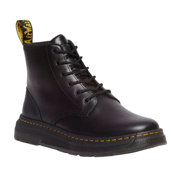 Black lace-up boot with a yellow AirWair heel loop and yellow stitching on the sole, featuring a chunky treaded platform.