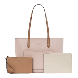 A set of three luxury bags including a light pink tote with tan handles, a tan wristlet, and a cream zip pouch.