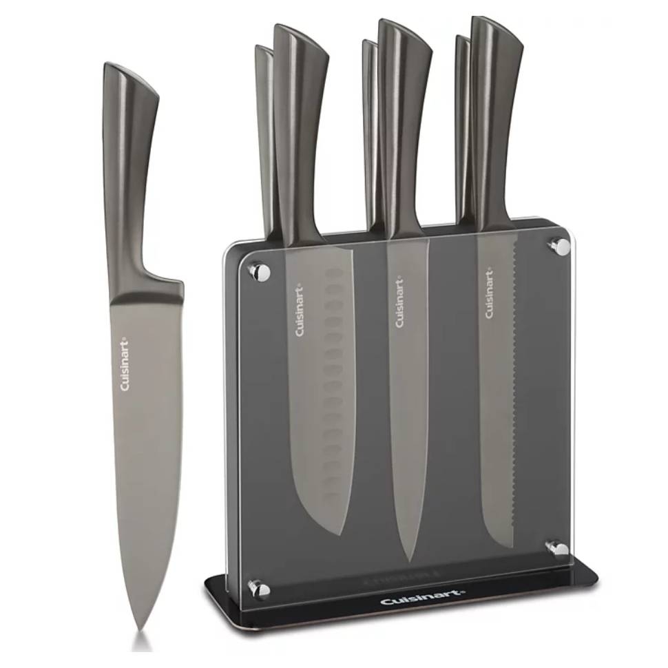 Cuisinart knife set includes five stainless steel knives with a sleek grey finish, featuring various blade types, held in a transparent stand.