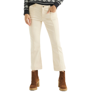 Cream-colored pants with a bootcut fit, featuring front pockets, belt loops, and a button closure. Paired with brown ankle boots and a black and white patterned sweater.