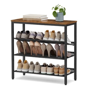 A multi-tier shoe rack with a wooden top, holding three rows of shoes, including sneakers and high heels. A small potted plant and books are placed on the top surface.