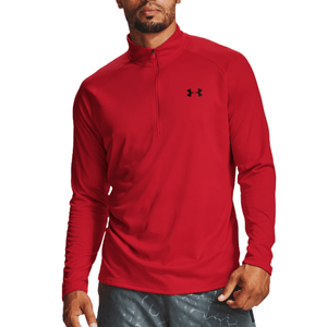 A red long-sleeve Under Armour quarter-zip shirt is worn by a person paired with gray-patterned shorts.