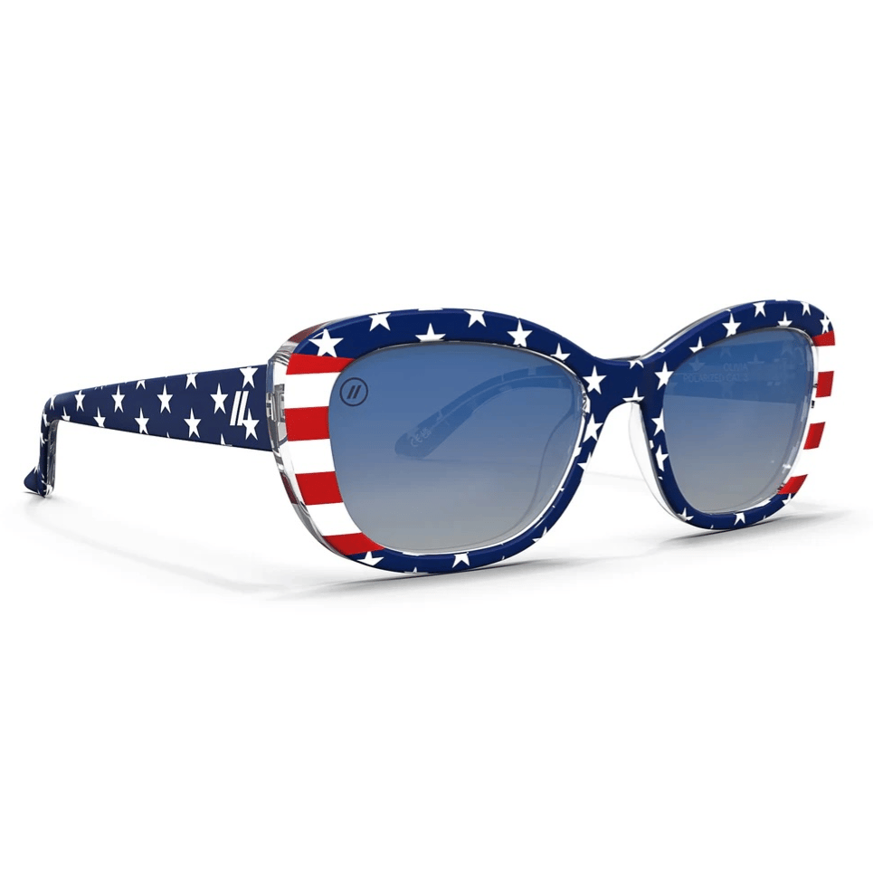 Patriotic-themed sunglasses feature a frame with the American flag pattern, showcasing blue with white stars and red stripes, and tinted lenses.