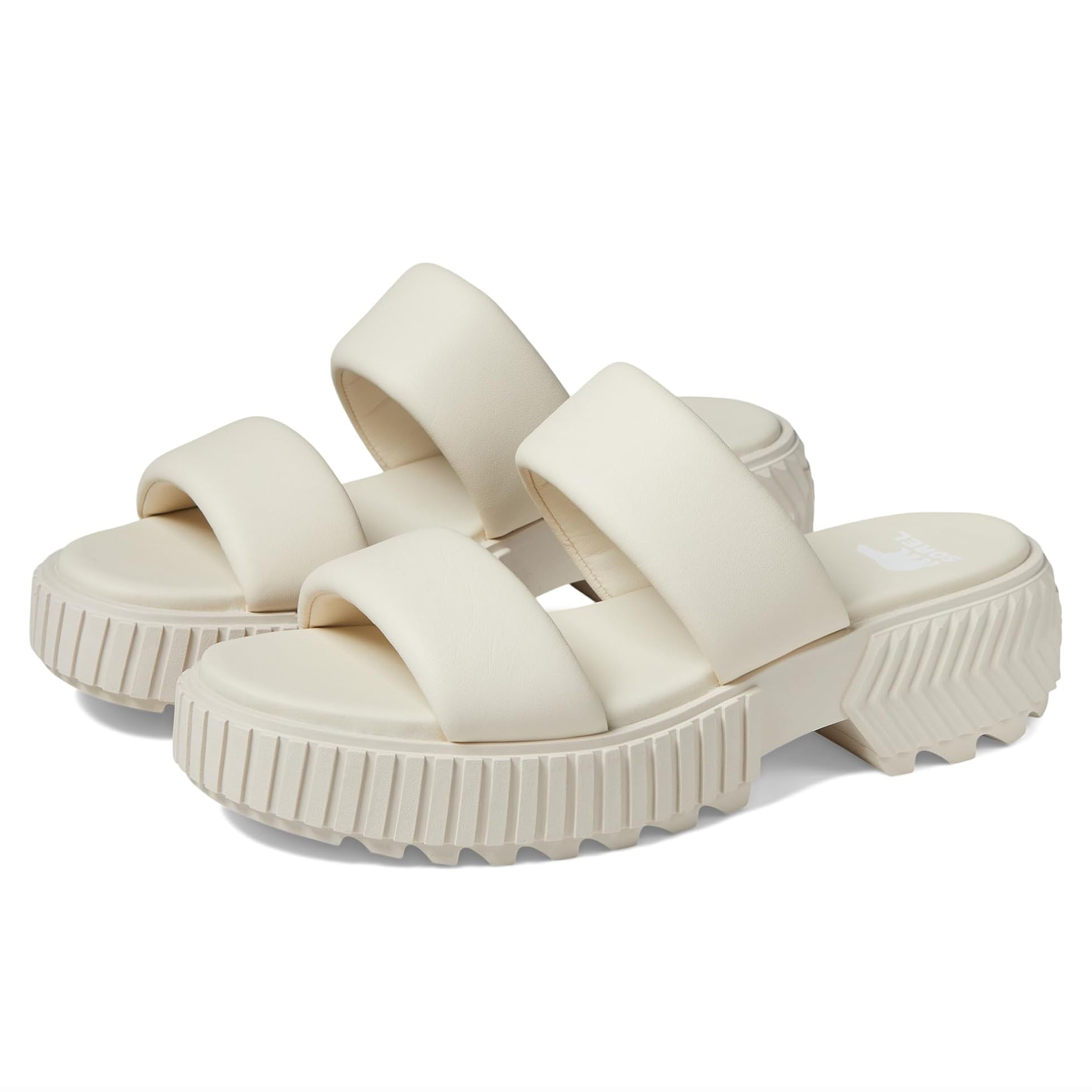 Sorel Ona Sandals feature a chunky lug sole and dual wide straps in a neutral beige color, offering a blend of comfort and rugged style for casual wear.