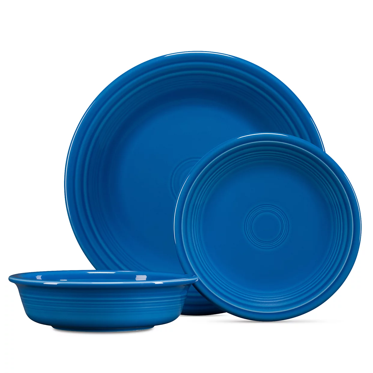 A 3-piece Fiesta Dinnerware Set in vibrant blue, featuring a large dinner plate, a smaller salad plate, and a bowl, all with a classic ring pattern.