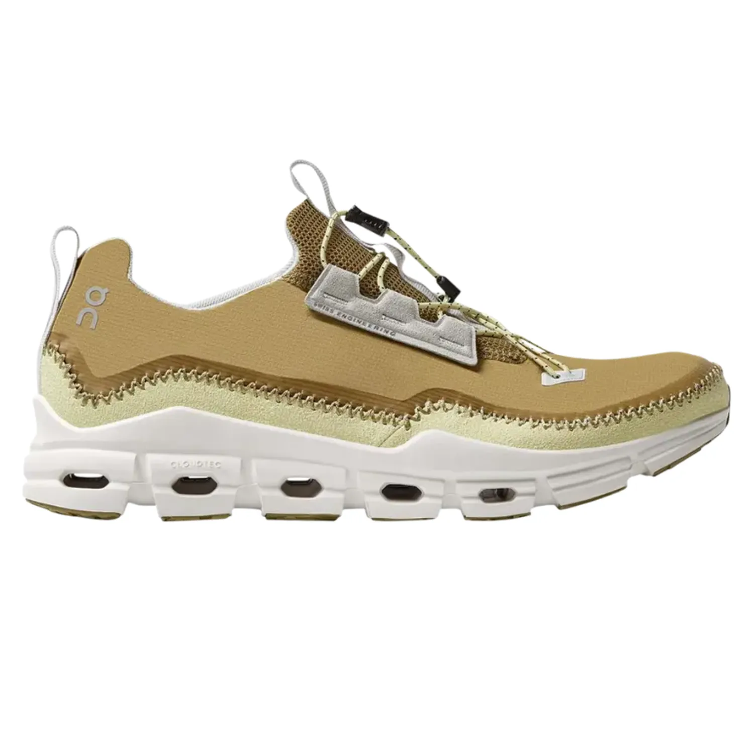 Tan On Running Cloudaway shoes feature a lightweight design with a breathable mesh upper, secure toggle lacing, and white CloudTec sole for cushioning.