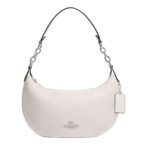 A white leather hobo bag from Coach Outlet featuring a silver chain strap, minimalist design, and a subtle Coach logo and tag.