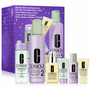 Clinique skincare set for dry combination skin includes Liquid Facial Soap, Clarifying Lotion, and Dramatically Different Moisturizing Lotion, designed for skincare routines at home and while traveling.