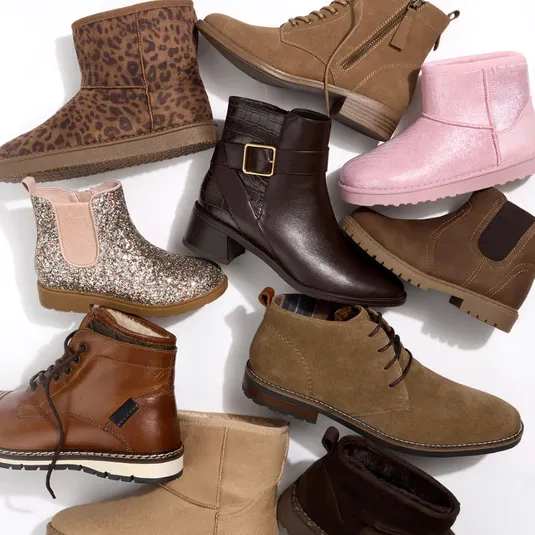 A variety of boots including leopard print, pink, glitter, brown leather, and suede designs with different heel styles and textures are arranged on a white background.