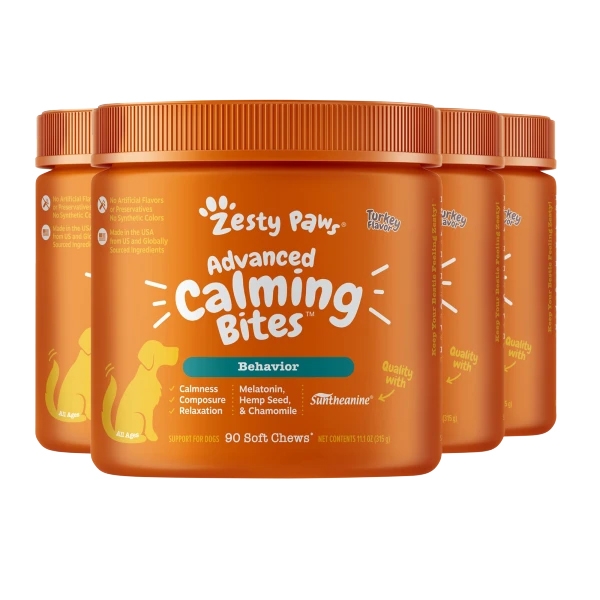 Three containers of Zesty Paws Advanced Calming Bites for dogs, turkey-flavored with supplements like melatonin and chamomile.