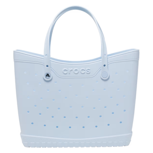 Light blue Crocs Classic Large Tote with perforated design, dual handles, and logo on the front.