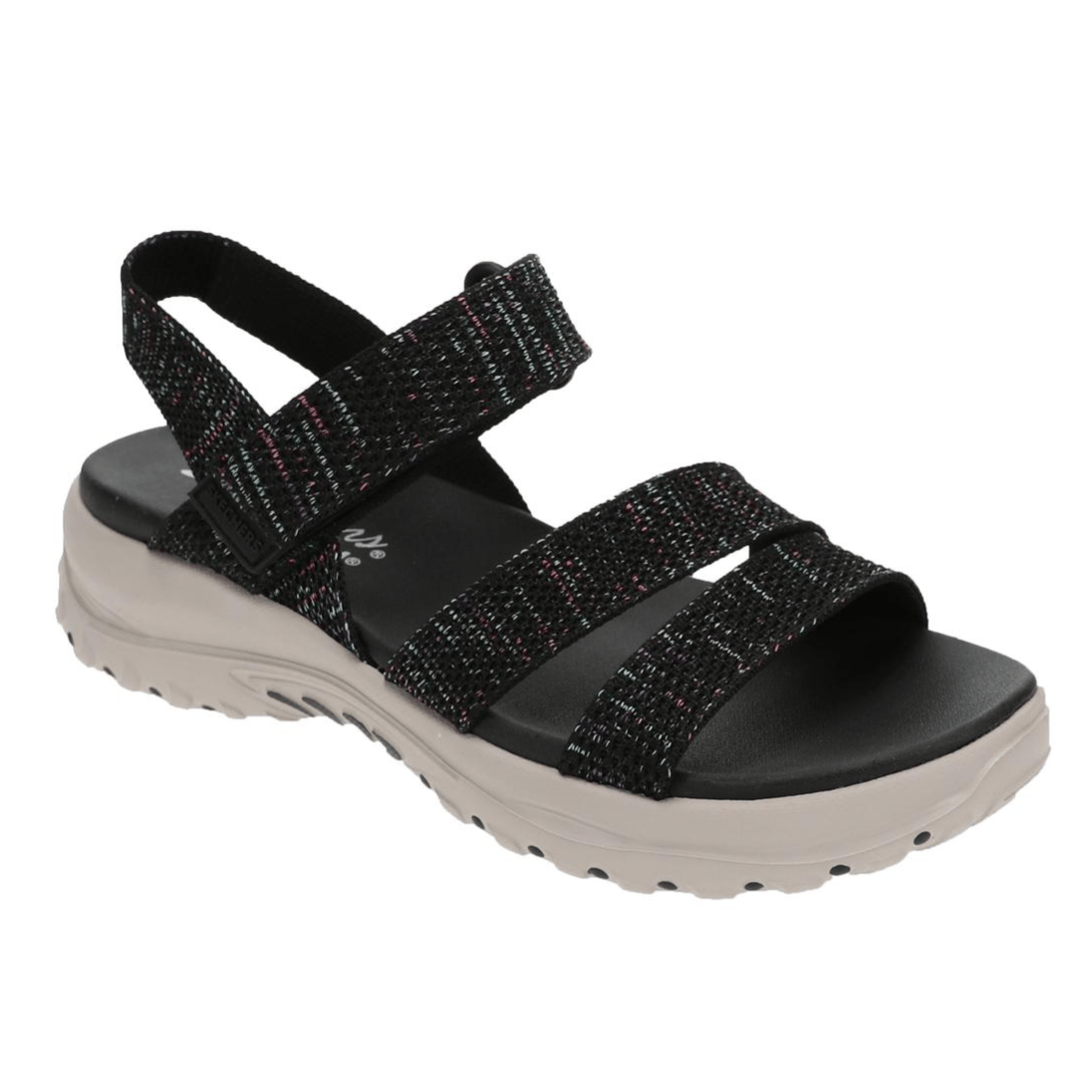 A black sandal with adjustable fabric straps and a thick, textured white sole designed for comfort and support.