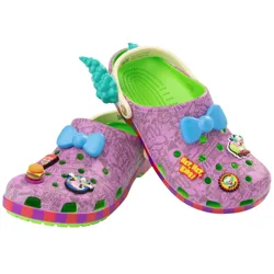 A pair of colorful clogs featuring a purple and green design with cartoon-themed decorations, including blue bows and various character charms.