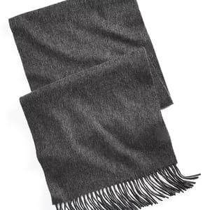 Dark gray scarf with fringe detailing at the ends, made from a soft, textured fabric.