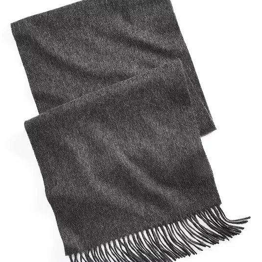 Dark gray scarf with fringe detailing at the ends, made from a soft, textured fabric.