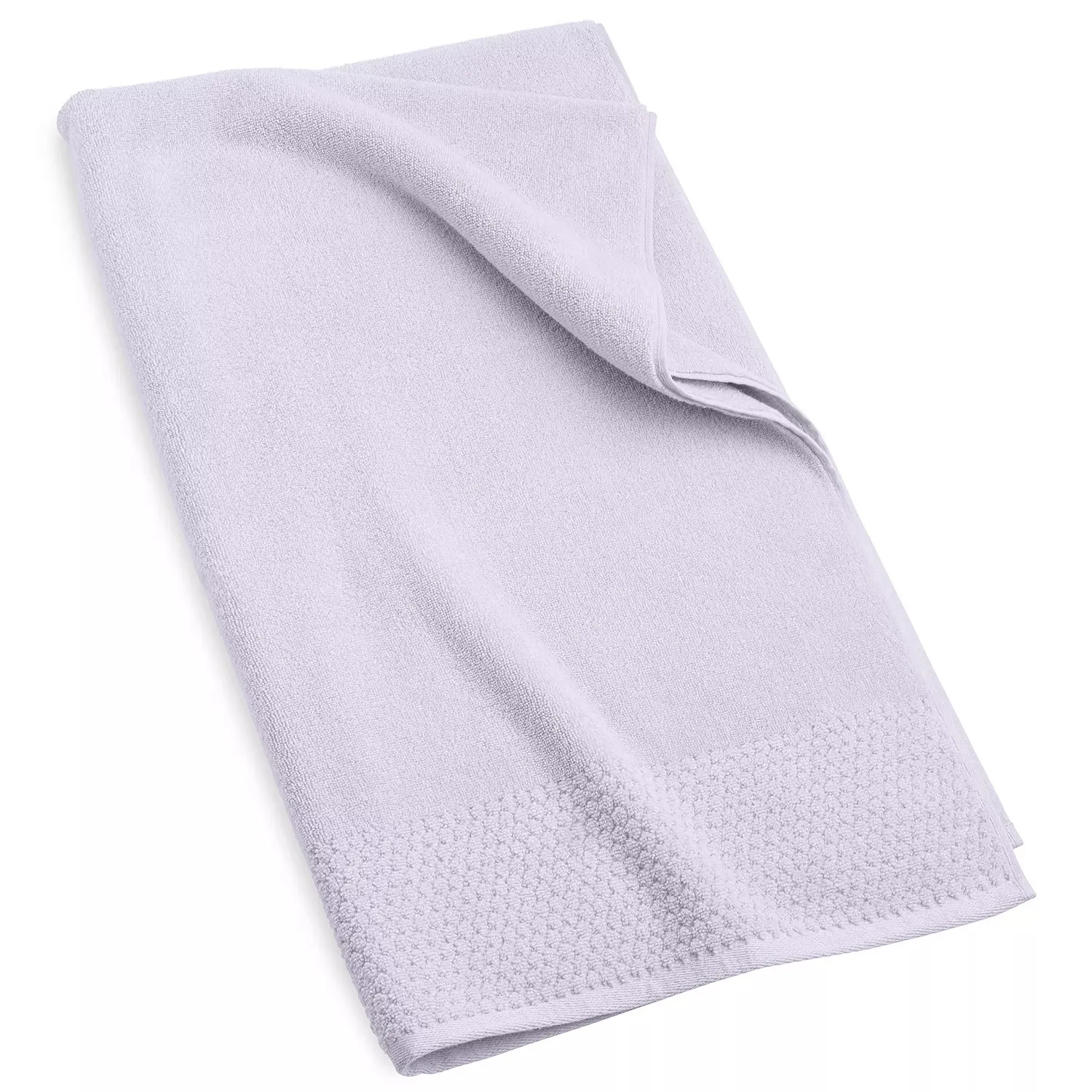 A light purple towel with a textured border, partially folded.