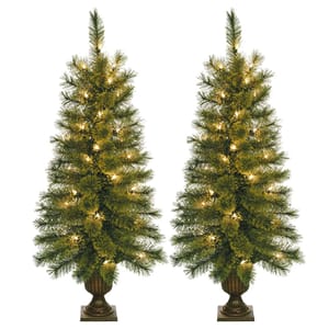 Two identical artificial porch trees approximately 3.5 feet tall, pre-lit with white lights, presented in a classic planter-style base.