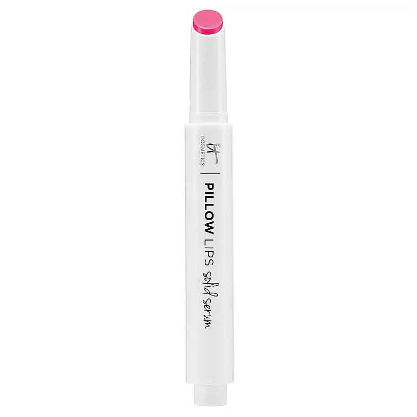 It Cosmetics Pillow Lips Solid Serum features a sleek white tube with pink lip color. It's designed to provide a moisturizing lip treatment with a hint of color.