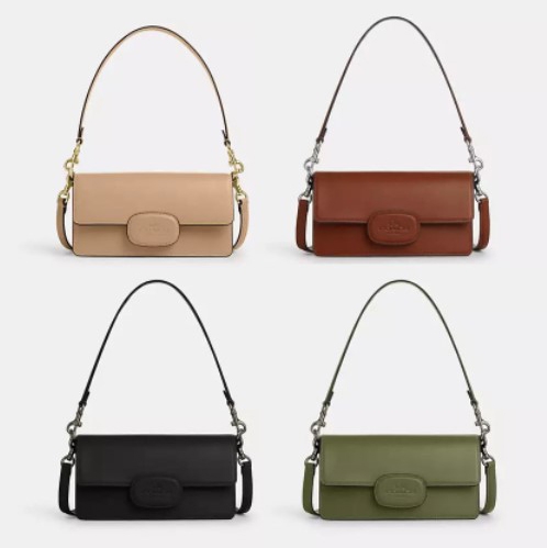Four leather shoulder bags in varying colors: beige, brown, black, and green, each with a front flap closure and a shoulder strap.