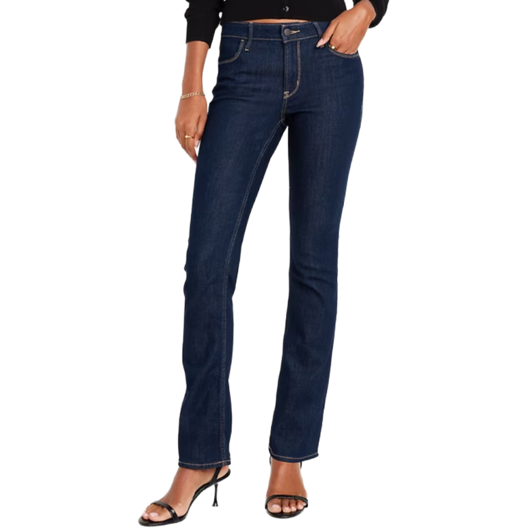 Dark blue slim-fit jeans with a mid-rise waist, paired with black strappy sandals.
