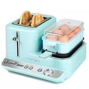 A turquoise breakfast station with a toaster and egg cooker combined.