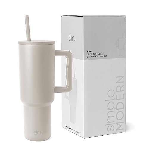 A 40-ounce Simple Modern tumbler with a handle and straw is presented next to its packaging box. The tumbler and box are primarily white with the brand's logo.