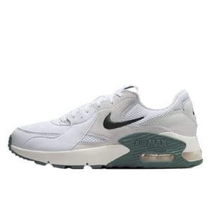 Nike Women's Air Max Excee Shoes feature a white mesh and synthetic upper with a green foam midsole, visible Air Max cushioning, and a black Swoosh logo.