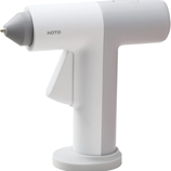 A white, handheld electric glue gun with a modern design, featuring a nozzle and trigger, branded with \“HOTO.\“
