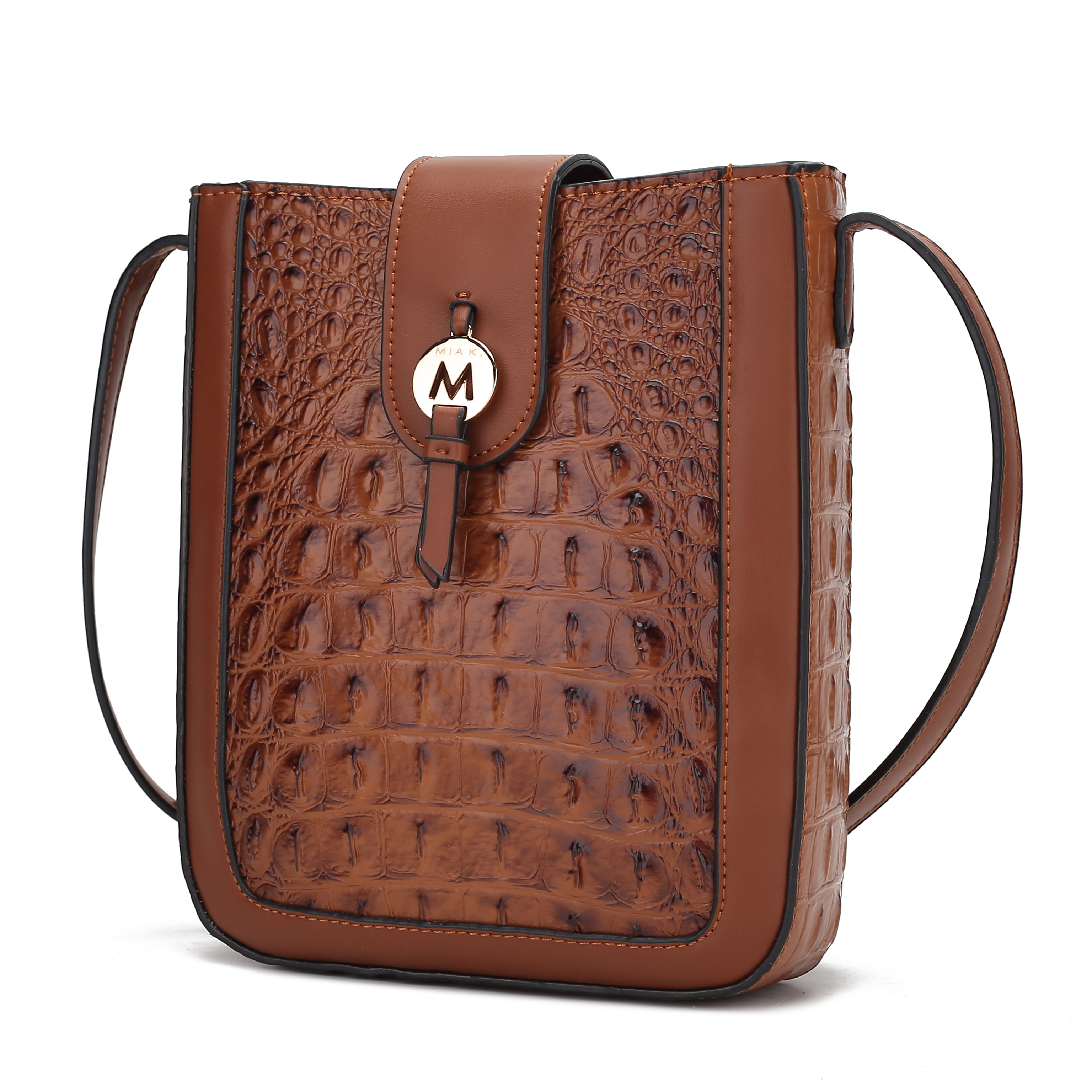 A brown leather crossbody bag with a crocodile skin texture and an \“M\“ logo on the front flap.