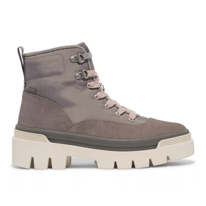 Keds Soho Lugged Boots feature a high-top design with taupe-colored uppers, metal eyelets, and multicolored laces. They have chunky off-white lugged soles for enhanced traction.