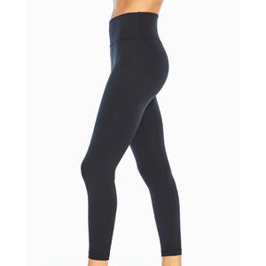 High-waisted black leggings featuring a sleek, form-fitting design.