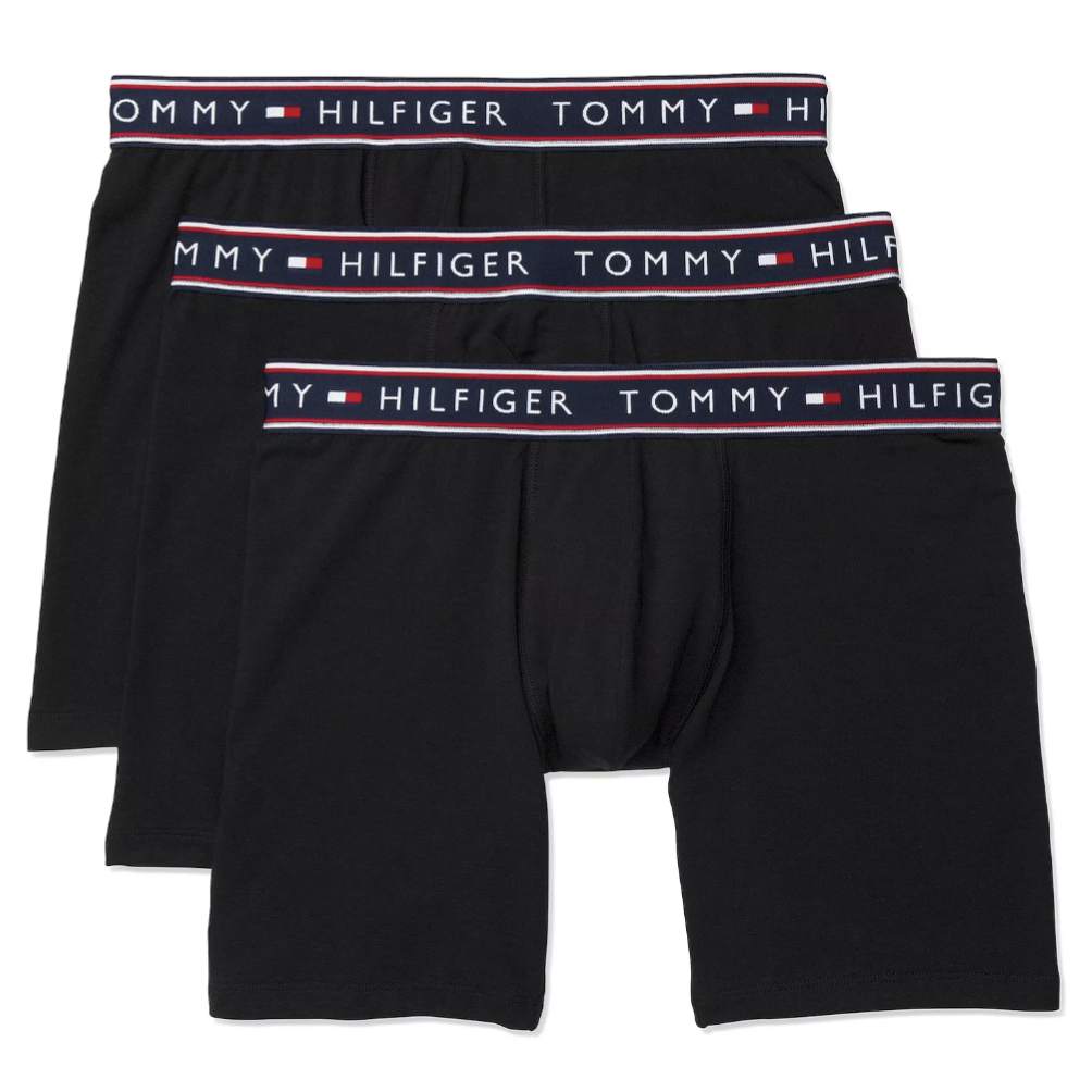 Three pairs of black Tommy Hilfiger boxer briefs with a branded waistband.