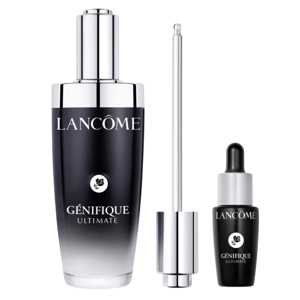 Lancôme Génifique Ultimate set includes a large serum bottle with a dropper and a smaller vial. The packaging is sleek with a black-to-clear gradient design.