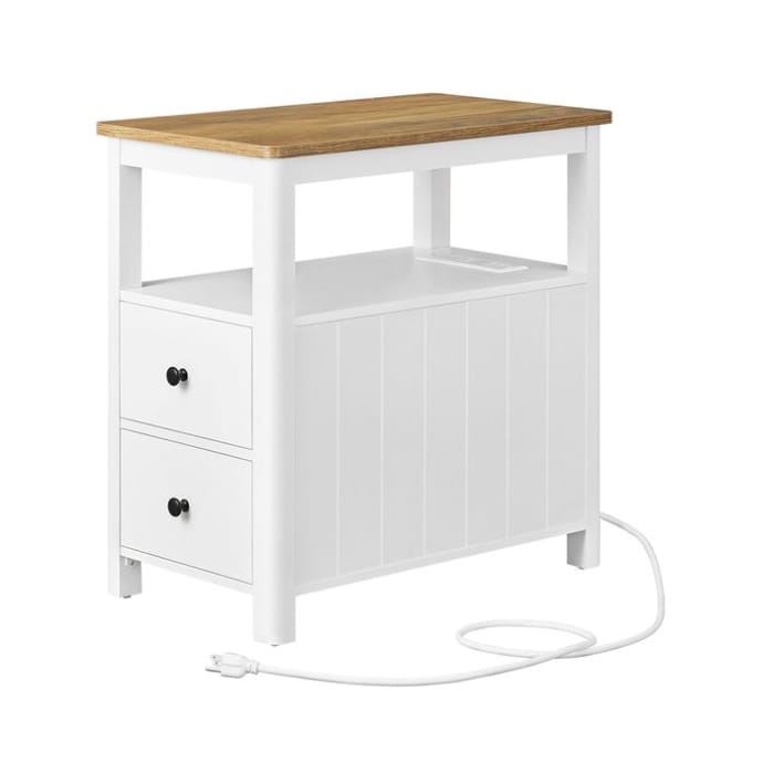A compact white side table with two drawers, a natural wood top, and an integrated charging station. It features a cable and plug for easy access to power.