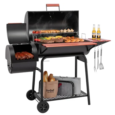 A charcoal grill with a side smoker, loaded with grilled meats, vegetables, and bread. It features a side shelf with two bottles, grilling tools hanging, and storage space below for accessories.