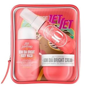 Sol de Janeiro Bom Dia Set includes a body wash, a brightening cream, and a mist in a clear travel pouch.