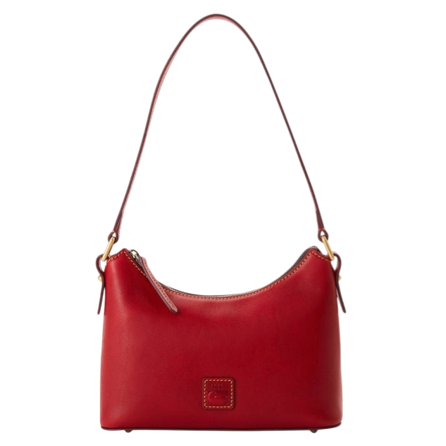 Red leather shoulder bag with a curved design, featuring a zipper closure and adjustable strap with gold-tone hardware.