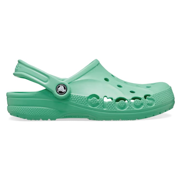 Green Crocs clog with cut-out holes and an adjustable strap. Features the Crocs branding on the side and a logo button near the strap hinge.