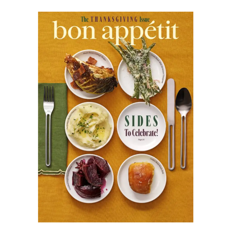 Bon Appétit Thanksgiving issue cover featuring side dishes: maple bacon cabbage wedges, green beans with Parmesan vinaigrette, mashed potatoes, glazed purple sweet potatoes, and golden brown dinner rolls alongside utensils on a mustard-yellow background.