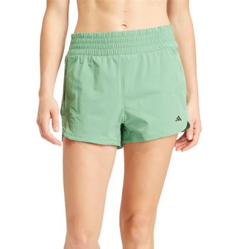 Light green Adidas shorts with an elastic waistband and a small logo on the left leg.