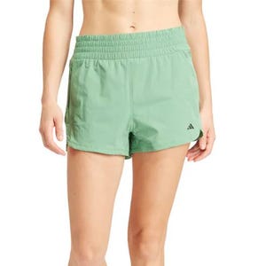 Light green Adidas shorts with an elastic waistband and a small logo on the left leg.